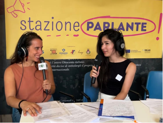 Tera Map Türkiye İstanbul etkinlik eventi Foligno Italia Tera Holding — Stazione Parlante Foligno Italia radio podcast eventi interview with headphones RØDE microphones yellow banner and EU co-funded DEAR program logos